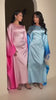 Elegant Muslim women wearing breathable abayas and modest dresses from ZySa Collection – lightweight fabrics and timeless design for everyday wear, Eid, and special occasions.